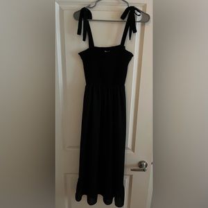 New condition black midi dress size medium